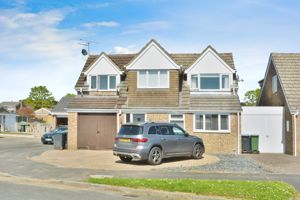 Front with driveway parking- click for photo gallery